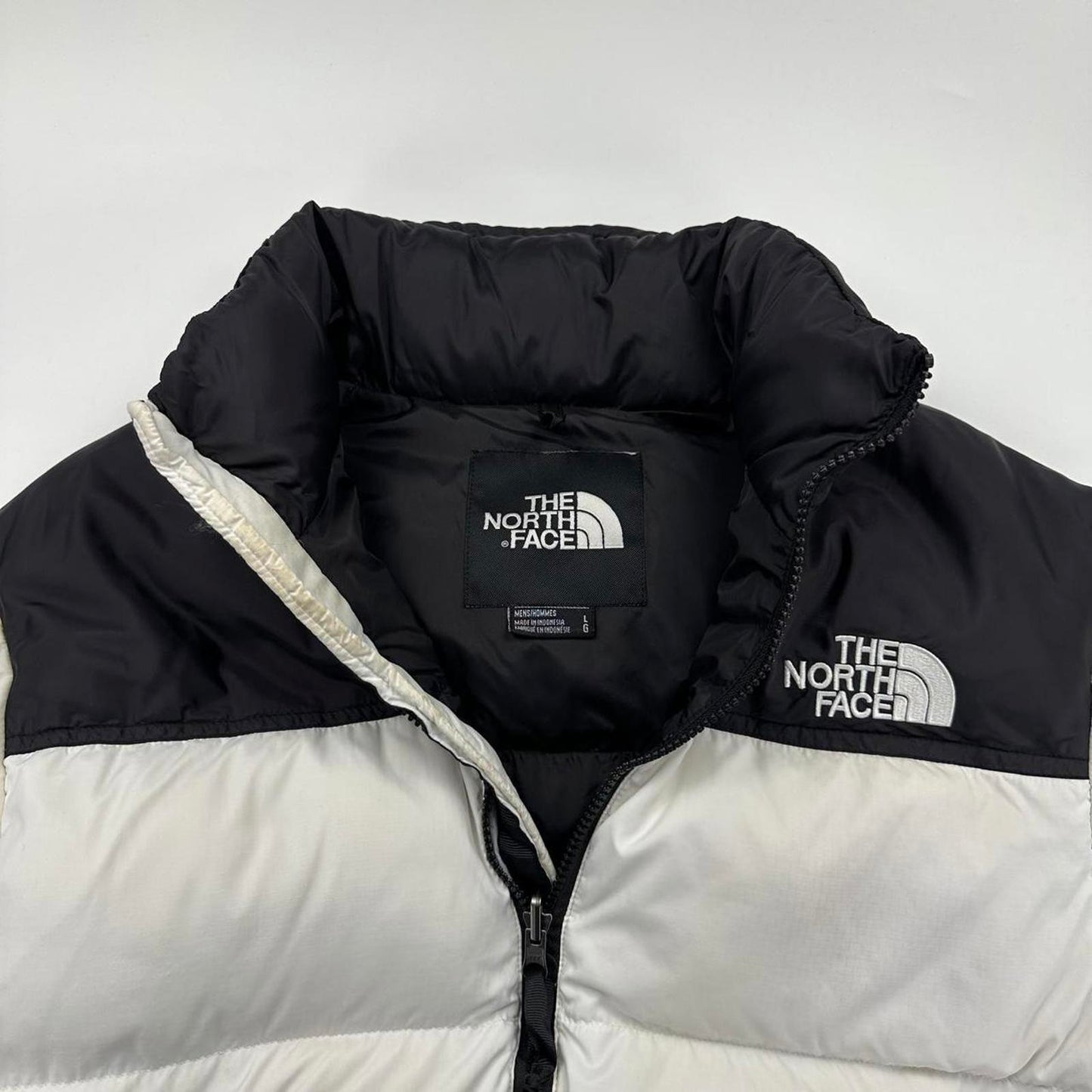 The North Face TNF 1996 Nuptse Puffer Jacket in white and black.