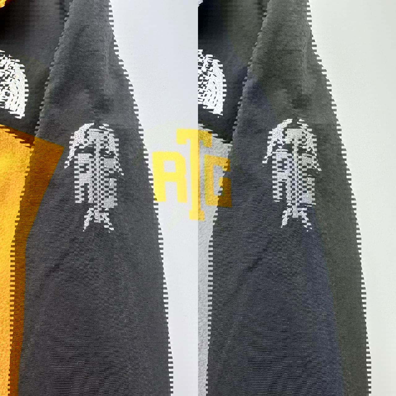 Supreme x The North Face TNF RTG Fleece Jacket in yellow and black.