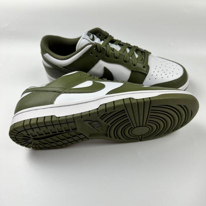 Nike Dunk Low in olive green and white.
