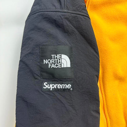 Supreme x The North Face TNF RTG Fleece Jacket in yellow and black.