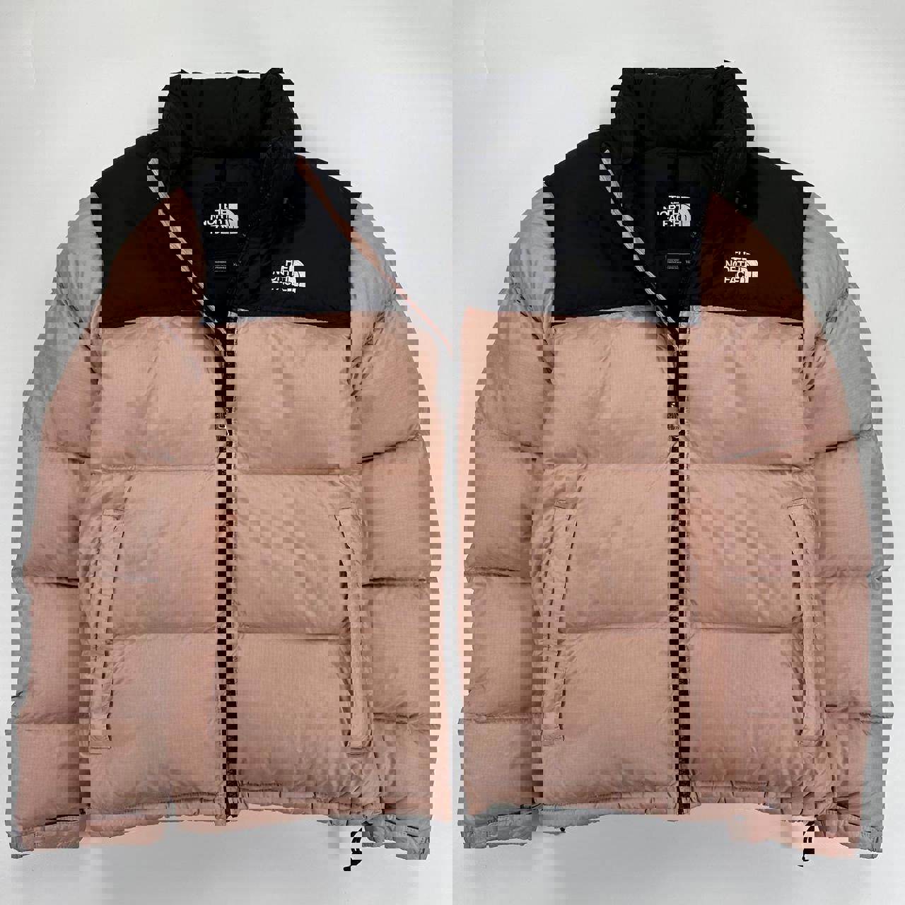 The North Face TNF 1996 Nuptse Puffer Jacket in light pink and black.