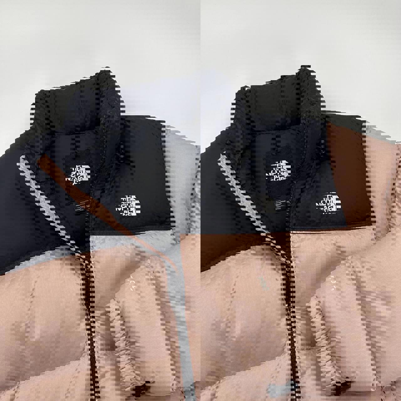 The North Face TNF 1996 Nuptse Puffer Jacket in light pink and black.
